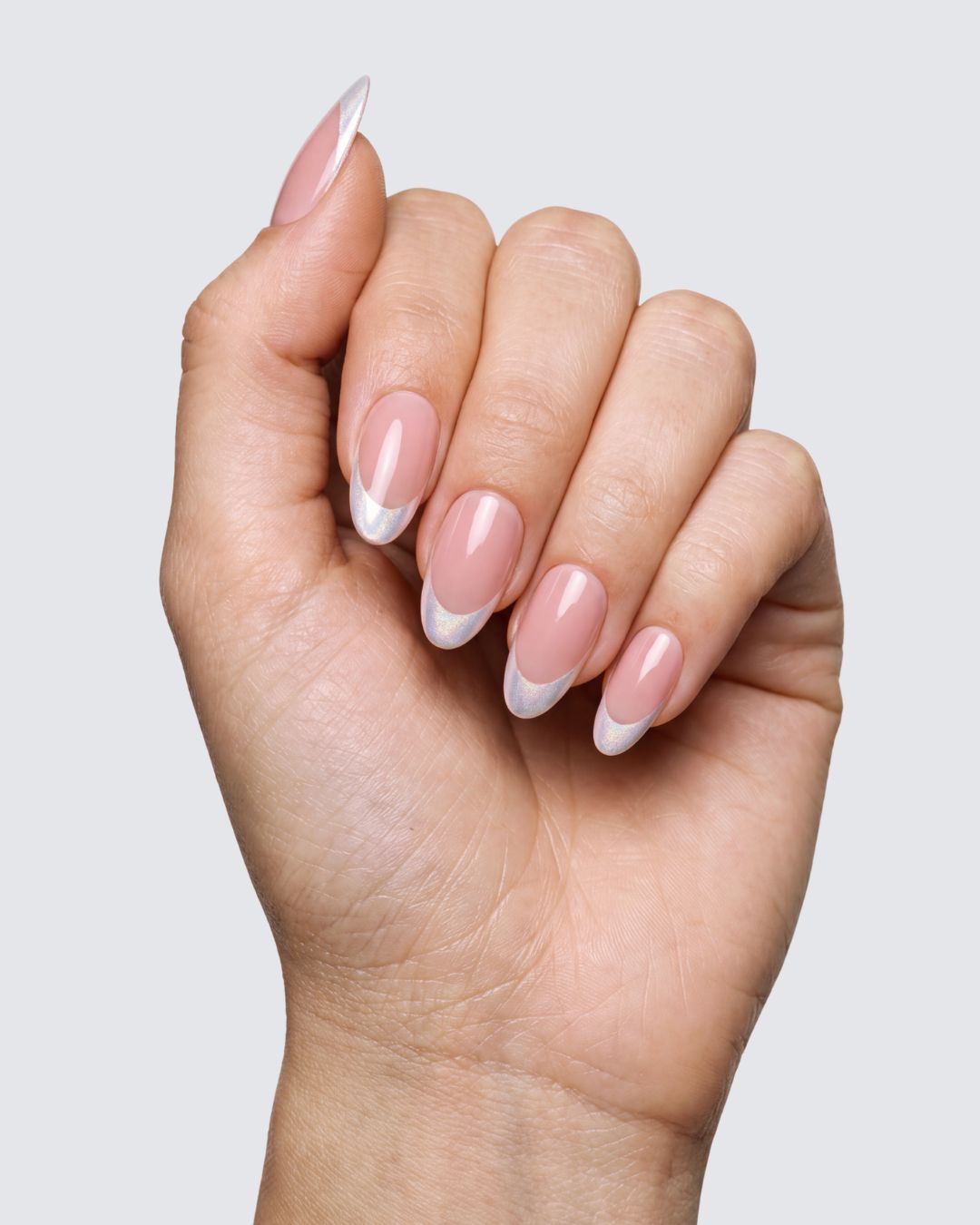 Bianca press on nails, glossy nude almond with a pearly chrome french tip