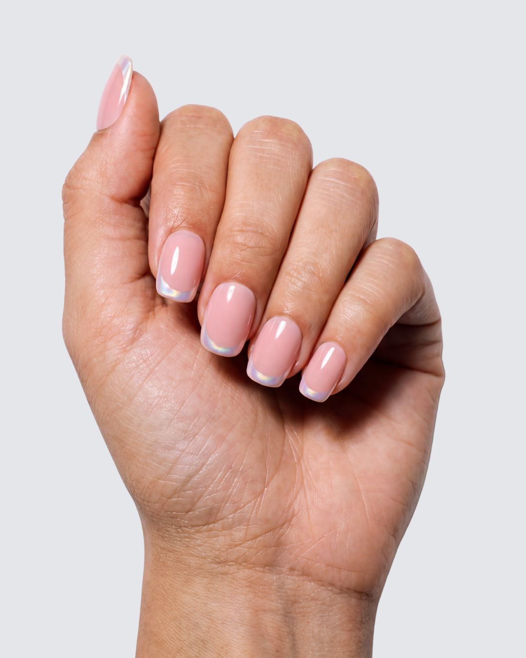 Perla press on nails, pink nude squoval with a pearly iridescent french tip