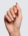 Prowl press on nails, sheer nude almond with a leopard print french tip